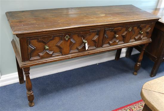 A 17th century style oak dresser base, W.153cm